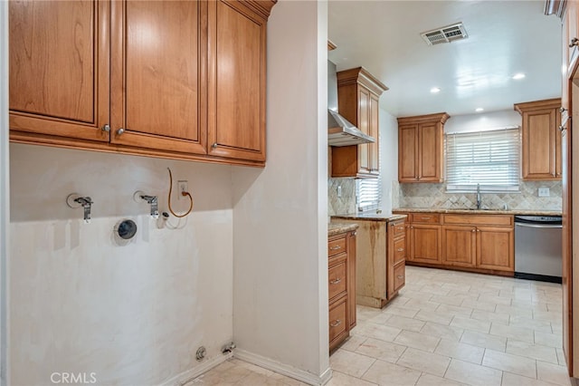 20129 Halsted St, Chatsworth, CA 91311 - washroom featuring a sink and baseboards