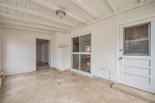 20129 Halsted St, Chatsworth, CA 91311 - unfurnished room featuring a wooden ceiling with exposed beams