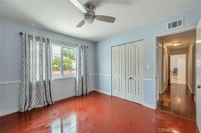 20129 Halsted St, Chatsworth, CA 91311 - unfurnished bedroom with hardwood / wood-style flooring, a closet, and ceiling fan