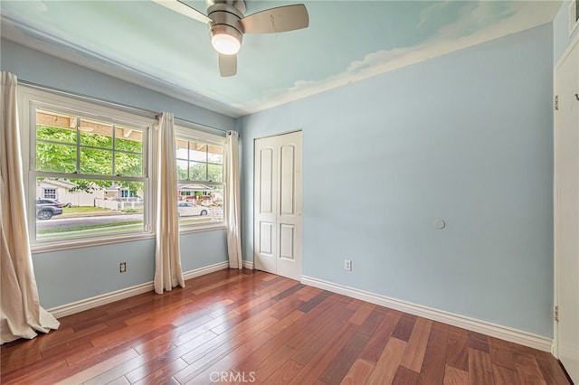 20129 Halsted St, Chatsworth, CA 91311 - empty room with wood finished floors and a ceiling fan
