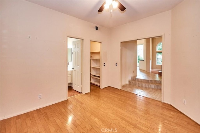 26821 Moore Oaks Rd, Laguna Hills, CA 92653 - spare room featuring light wood-type flooring and ceiling fan