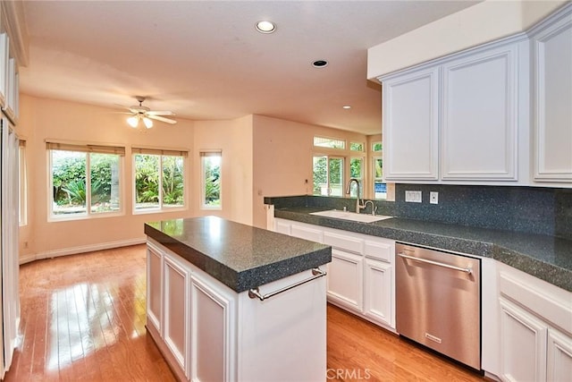 26821 Moore Oaks Rd, Laguna Hills, CA 92653 - kitchen with dishwasher, a center island, recessed lighting, light wood-style floors, and ceiling fan