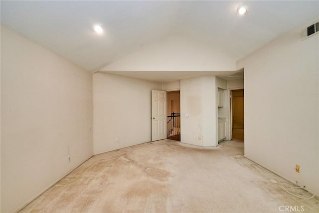 26821 Moore Oaks Rd, Laguna Hills, CA 92653 - unfurnished bedroom featuring light carpet, lofted ceiling, and recessed lighting