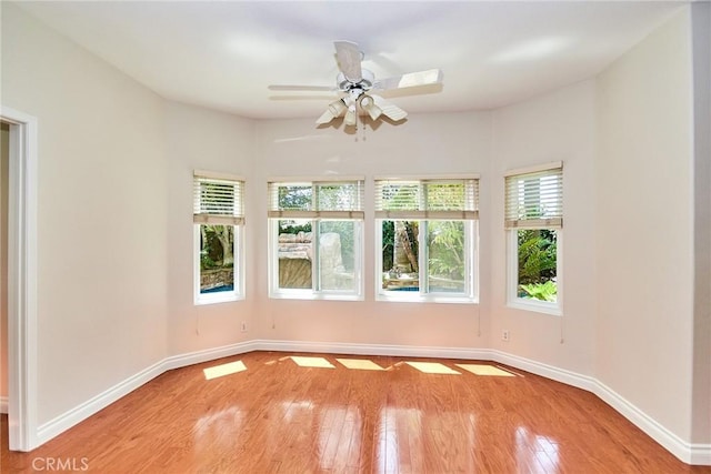 26821 Moore Oaks Rd, Laguna Hills, CA 92653 - empty room with wood finished floors and ceiling fan