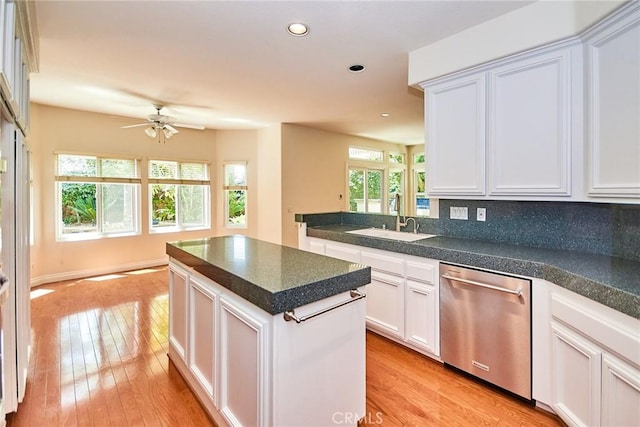 26821 Moore Oaks Rd, Laguna Hills, CA 92653 - kitchen featuring dishwasher, recessed lighting, dark countertops, ceiling fan, and light wood-style floors