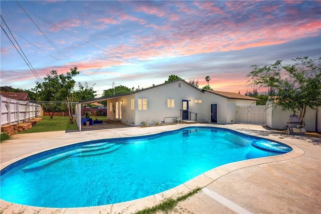 10028 Judy Ct, Riverside, CA 92503 - view of pool with a patio area and a fenced backyard