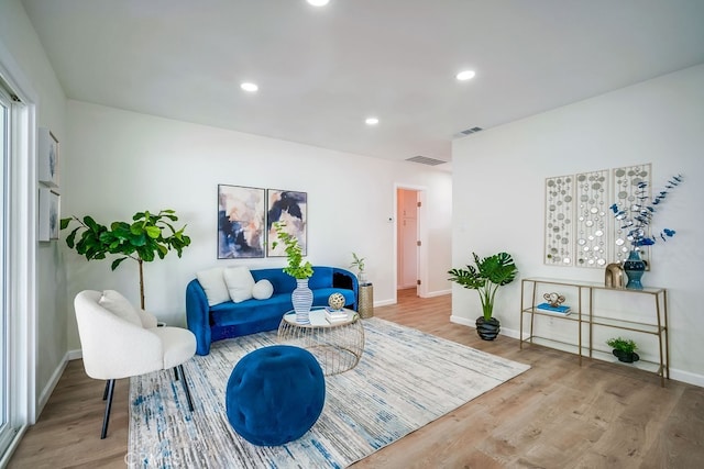 10028 Judy Ct, Riverside, CA 92503 - sitting room featuring wood finished floors and recessed lighting