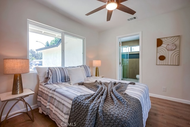 10028 Judy Ct, Riverside, CA 92503 - bedroom featuring wood finished floors, ensuite bathroom, and a ceiling fan