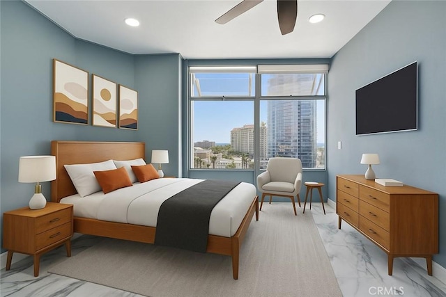 100 Atlantic Ave Unit 1012, Long Beach, CA 90802 - bedroom with light marble finish flooring, multiple windows, a ceiling fan, and recessed lighting