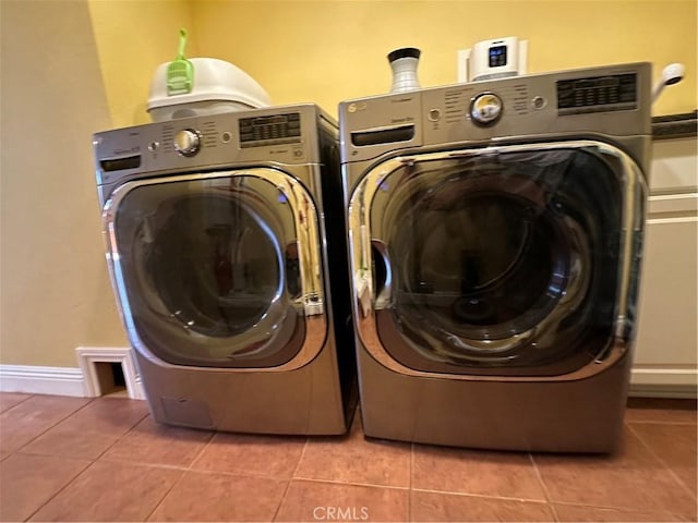 41379 Rainbow Ln, Forest Falls, CA 92339 - laundry area with washer and clothes dryer and light tile patterned flooring