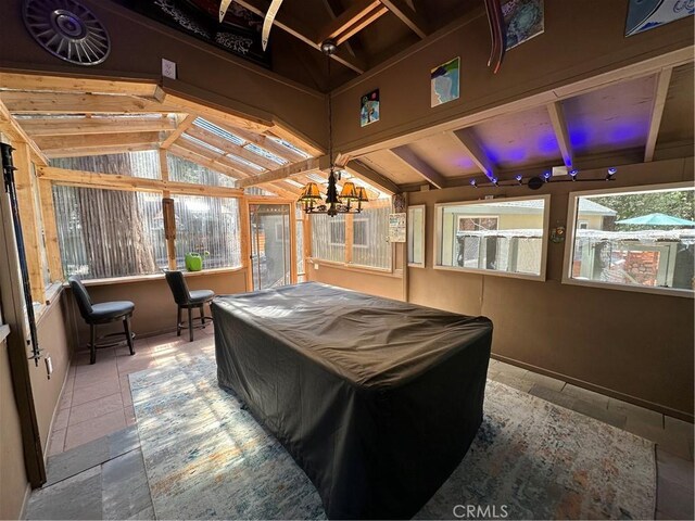 41379 Rainbow Ln, Forest Falls, CA 92339 - recreation room featuring pool table, lofted ceiling, stone tile flooring, and a chandelier