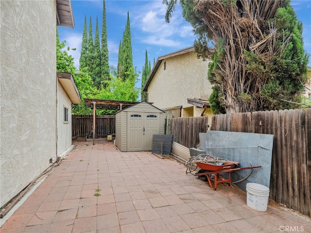 7800 Winnetka Ave, Winnetka, CA 91306 - fenced backyard with a storage unit and a patio
