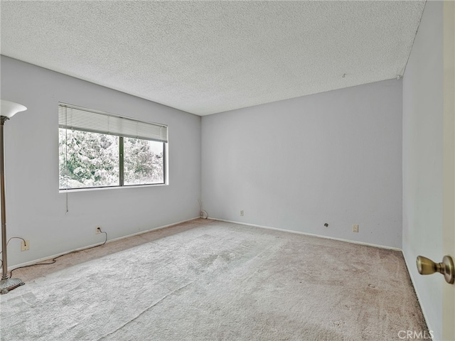 7800 Winnetka Ave, Winnetka, CA 91306 - unfurnished room with carpet flooring and a textured ceiling