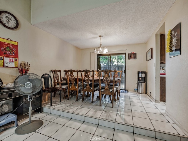 7800 Winnetka Ave, Winnetka, CA 91306 - dining space with a textured ceiling, light tile patterned floors, and a chandelier