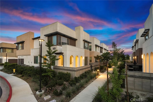 3540 E Peckham Paseo Unit 5, Ontario, CA 91761 - view of front facade featuring stucco siding