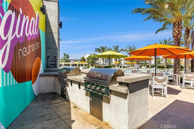 3540 E Peckham Paseo Unit 5, Ontario, CA 91761 - view of patio / terrace with an outdoor kitchen