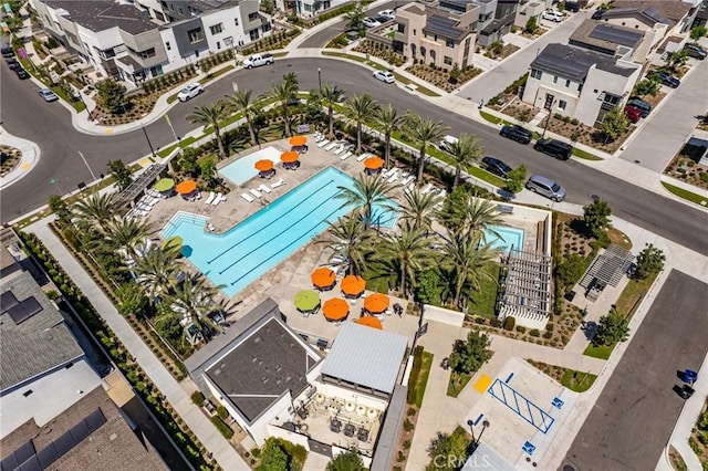 3540 E Peckham Paseo Unit 5, Ontario, CA 91761 - aerial perspective of suburban area featuring a pool