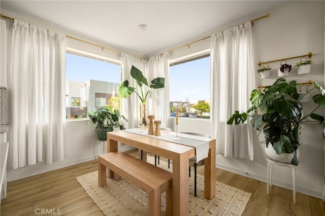 3540 E Peckham Paseo Unit 5, Ontario, CA 91761 - dining space featuring light wood-style floors
