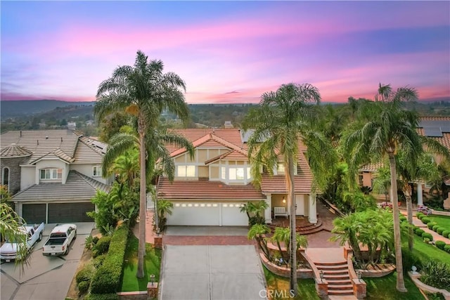 21620 Brisbane Way, Yorba Linda, CA 92887 - view of front of house with concrete driveway, stucco siding, an attached garage, and a tile roof