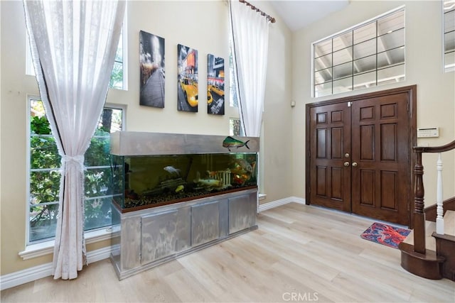 21620 Brisbane Way, Yorba Linda, CA 92887 - foyer with a high ceiling, wood finished floors, a fireplace, and stairway