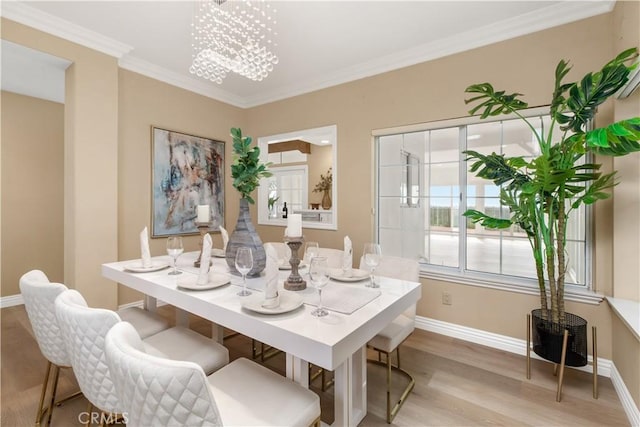 21620 Brisbane Way, Yorba Linda, CA 92887 - dining area with light wood finished floors, a chandelier, and crown molding