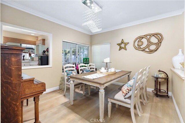 21620 Brisbane Way, Yorba Linda, CA 92887 - dining room with light wood-style flooring and crown molding