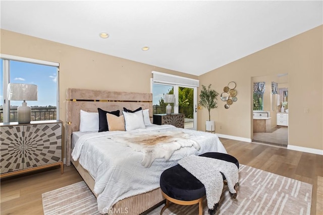 21620 Brisbane Way, Yorba Linda, CA 92887 - bedroom with wood finished floors, vaulted ceiling, ensuite bath, access to outside, and recessed lighting