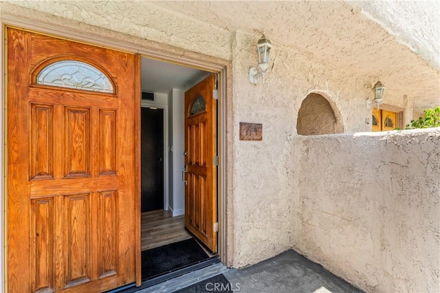 5401 Zelzah Ave Unit 114, Encino, CA 91316 - view of exterior entry featuring stucco siding