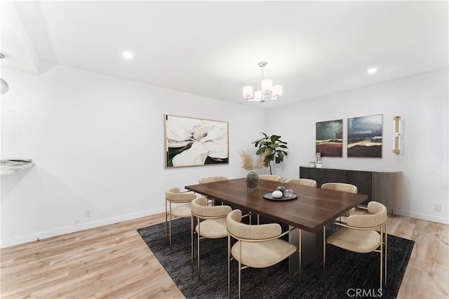 5401 Zelzah Ave Unit 114, Encino, CA 91316 - dining area with light wood-type flooring, a chandelier, and recessed lighting