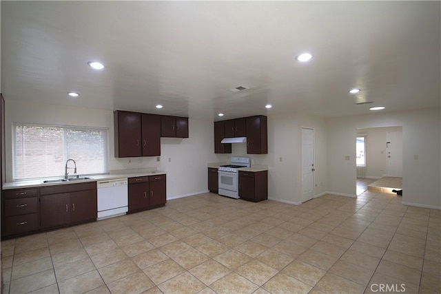764 E Turmont St, Carson, CA 90746 - kitchen featuring white appliances, under cabinet range hood, light countertops, recessed lighting, and dark brown cabinets