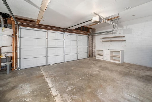 2056 Sierra Way, San Luis Obispo, CA 93401 - garage featuring a garage door opener and concrete block wall