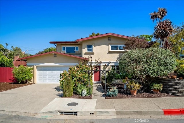 2056 Sierra Way, San Luis Obispo, CA 93401 - view of front of property with stucco siding, concrete driveway, and a garage