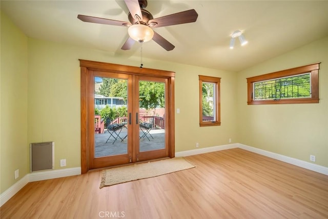 2056 Sierra Way, San Luis Obispo, CA 93401 - doorway with healthy amount of natural light, wood finished floors, french doors, and ceiling fan