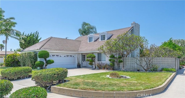 5361 Ludlow Ave, Garden Grove, CA 92845 - view of front facade with a chimney, a garage, concrete driveway, a front lawn, and a tile roof
