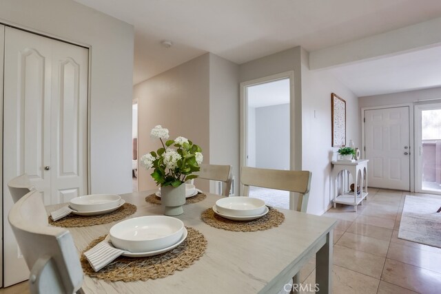 3456 Castle Glen Dr Unit 154, San Diego, CA 92123 - dining space with light tile patterned floors
