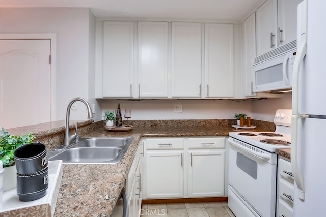 3456 Castle Glen Dr Unit 154, San Diego, CA 92123 - kitchen featuring white appliances, white cabinetry, light tile patterned flooring, and stone countertops