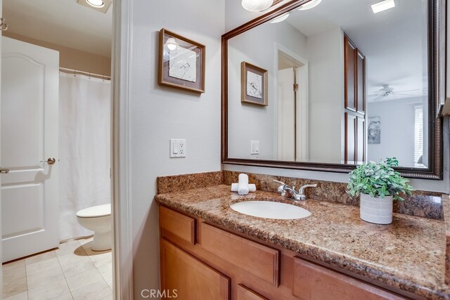 3456 Castle Glen Dr Unit 154, San Diego, CA 92123 - full bath featuring vanity, a ceiling fan, tile patterned floors, and curtained shower