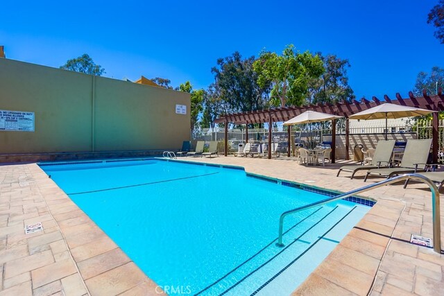 3456 Castle Glen Dr Unit 154, San Diego, CA 92123 - community pool featuring a pergola and a patio