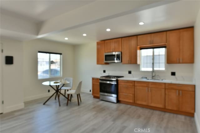 4820 W 142nd St, Hawthorne, CA 90250 - kitchen featuring stainless steel appliances, light wood-style flooring, plenty of natural light, and recessed lighting