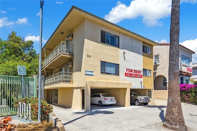 5923 Carlton Way, Los Angeles, CA 90028 - view of building exterior featuring an AC wall unit