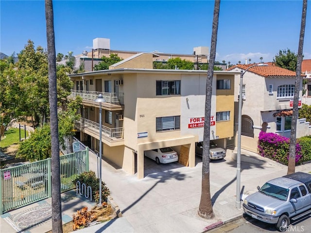 5923 Carlton Way, Los Angeles, CA 90028 - view of building exterior featuring a carport