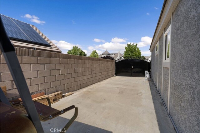 43419 37th St W, Lancaster, CA 93536 - view of patio / terrace featuring a gate