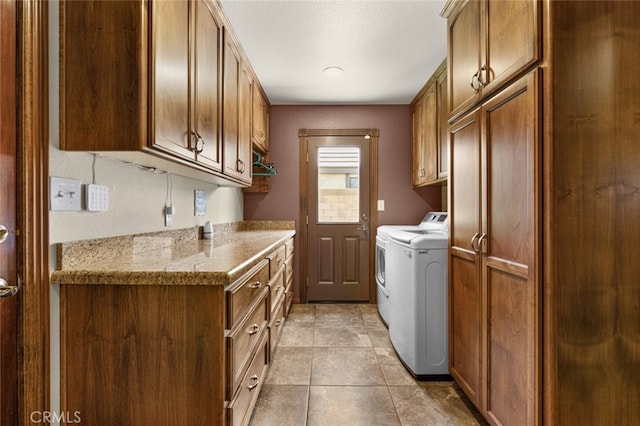 43419 37th St W, Lancaster, CA 93536 - washroom featuring cabinet space, washer and dryer, and tile patterned flooring