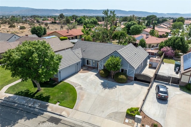 43419 37th St W, Lancaster, CA 93536 - aerial perspective of suburban area with a mountainous background