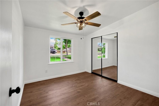 229 W Hacienda Dr, Corona, CA 92882 - unfurnished bedroom with wood finished floors, a ceiling fan, and a closet