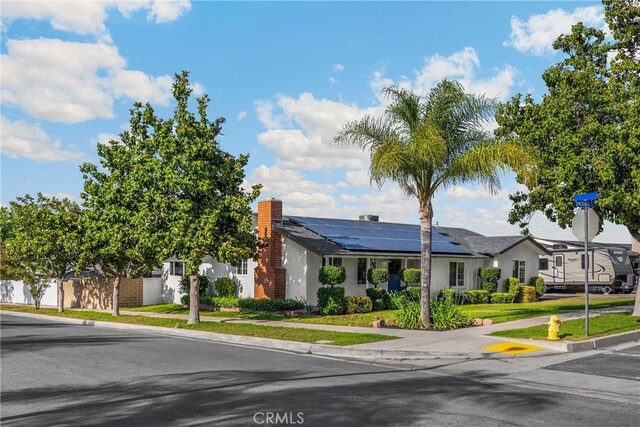 229 W Hacienda Dr, Corona, CA 92882 - view of front of property featuring solar panels