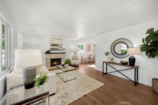 229 W Hacienda Dr, Corona, CA 92882 - living area with wood finished floors and a fireplace