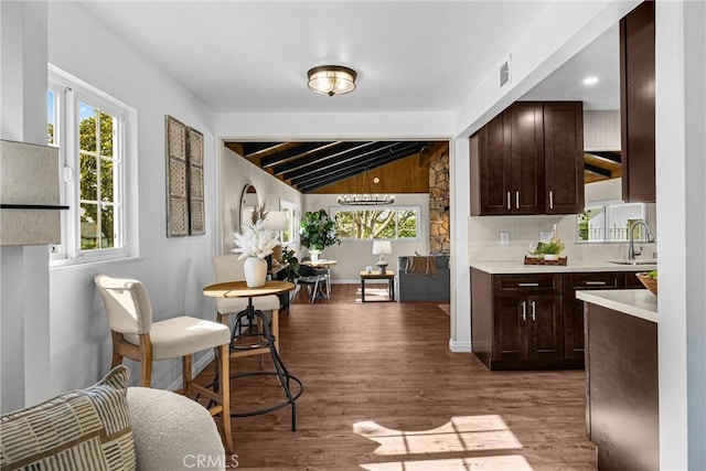 229 W Hacienda Dr, Corona, CA 92882 - kitchen featuring dark brown cabinets, light countertops, and wood finished floors