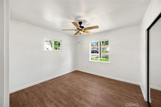 229 W Hacienda Dr, Corona, CA 92882 - unfurnished bedroom featuring a closet, wood finished floors, and a ceiling fan