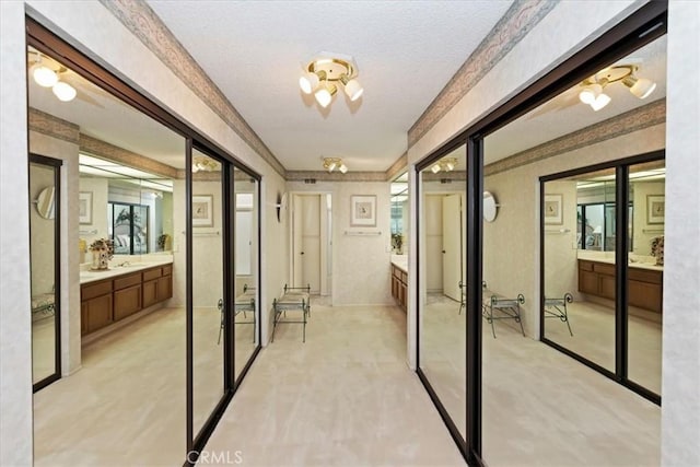 548 Via Ln, Paloma, Riverside, CA 92507 - entryway featuring a textured ceiling